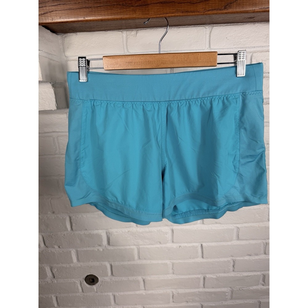 Athleta Turquoise Running Shorts Womens M 3.5 Inseam Lined Zip Pocket